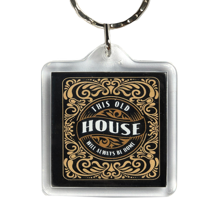 Keychain featuring "This Old House Will Always Be Home" text on one side and the Clint Black logo on the other.